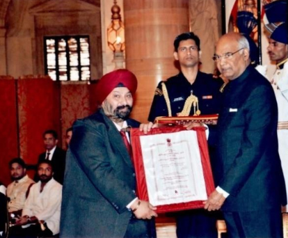 Receiving Award From President
